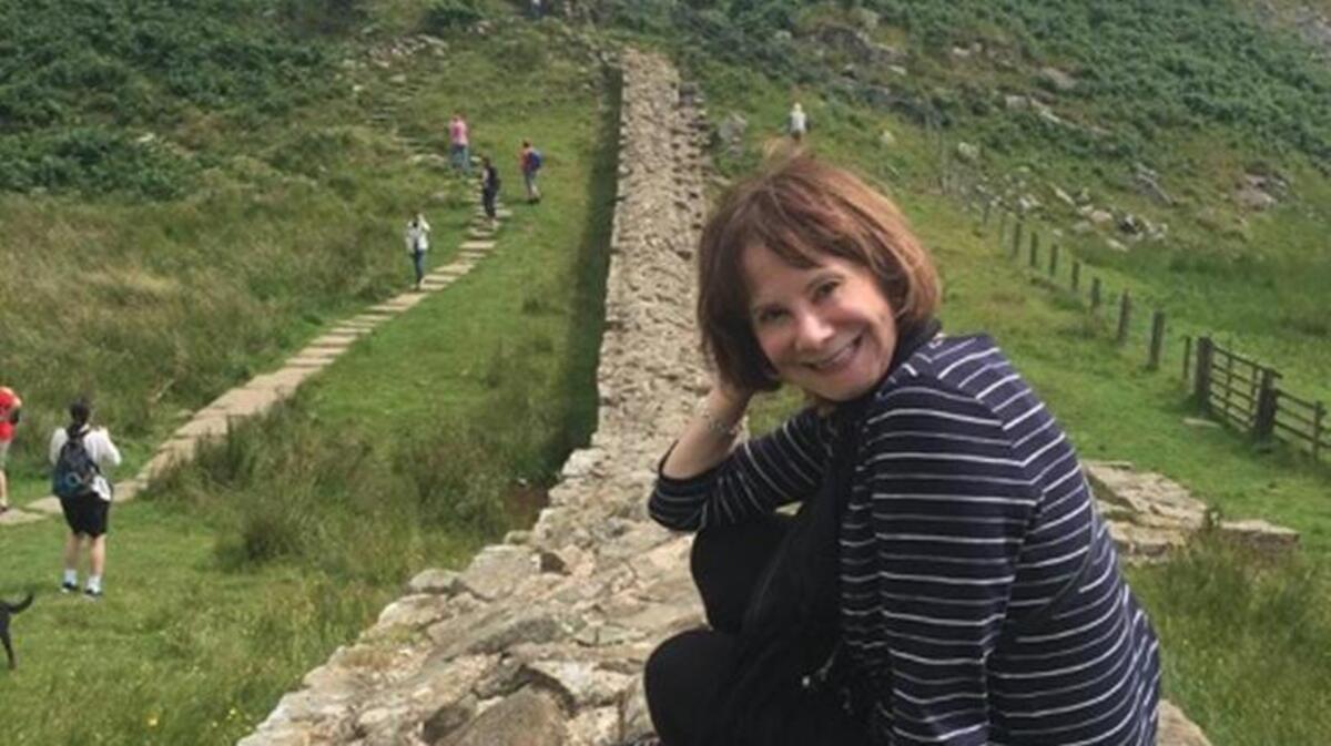 Marti Skarupa at Hadrian’s Wall, which was originally 16 to 20 feet high.