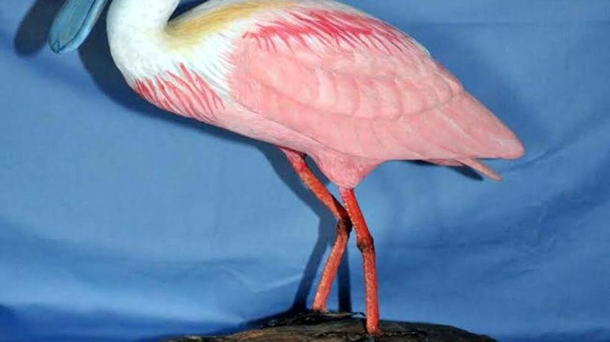 “Roseated Spoonbill” a wood sculpture by Bob Berman is among the works on display at the Pluff Mudd Gallery