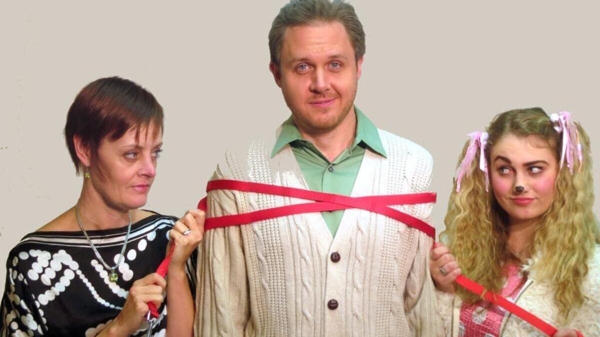 Christine Grefe as Kate, left, battles for the affection of her husband, Greg, played by Mark Erickson. Rebecca Donaldson, right, portrays the street-wise pup Sylvia.