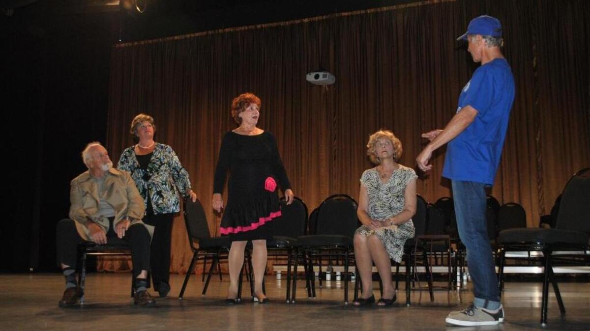 Bronx widow Bea Asher, center, played by Barbara Sweasy, listens to her son David’s reason as to why he has come to New York in the Sun City Community Theatre’s production of “Ballroom” by Michael Bennett. Shown in this scene are, from left, her brother-in-law Jack (Stu Blickstein), Bea’s late husband’s sister Helen (Lynda Bialko), Bea, Bea’s daughter Diane (Janice Kraimer), and David (Stan Grossman).