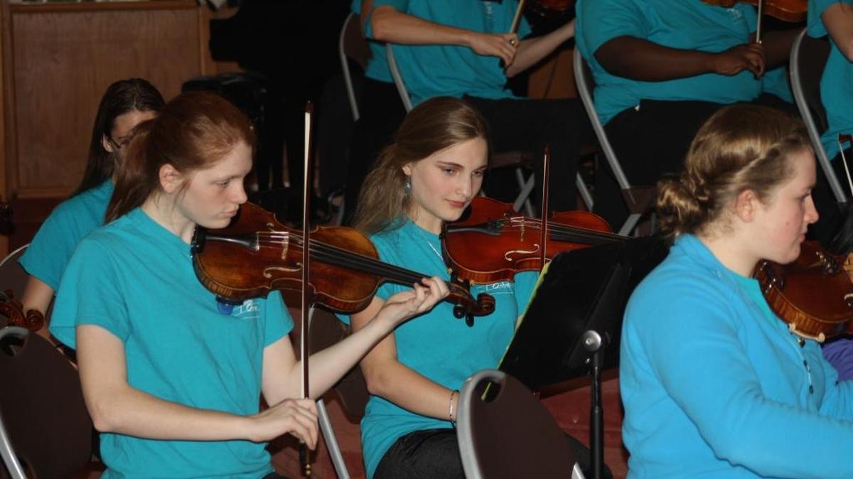 The Beaufort Symphony Orchestra will hold a “Side by Side Gala” April 10 featuring both its adult and youth orchestras. Featured (left to right) are Sydney Maddox, Elaine Hicks and Elizabeth Henderson with the youth orchestra.