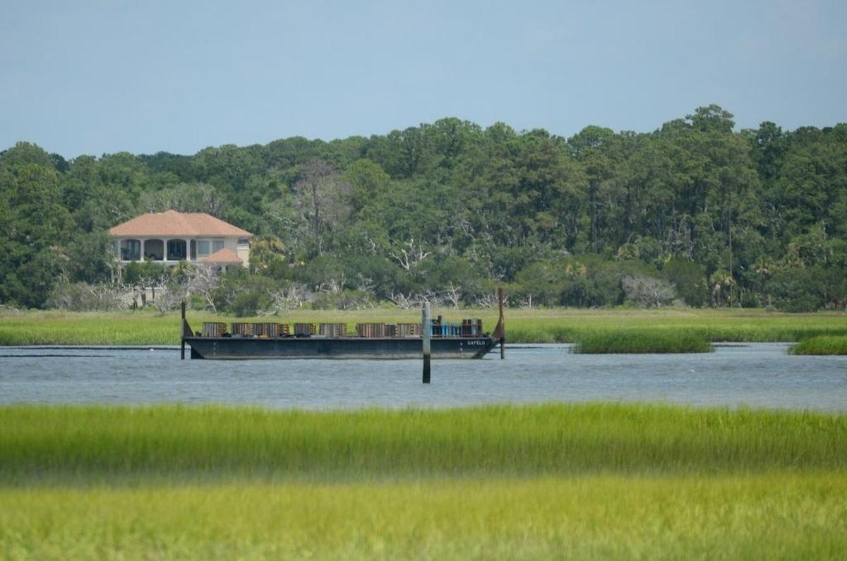 The barge off Shelter Cove Marina from which fireworks typically are launched sits empty July 5, 2016, on Hilton Head Island. The July 4 fireworks display at Shelter Cove HarbourFest was canceled at the last minute.
