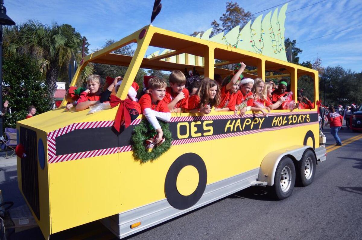 Among the many floats in the parade was this one from Okatie Elementary School depicting a school bus carrying kids and Christmas trees.