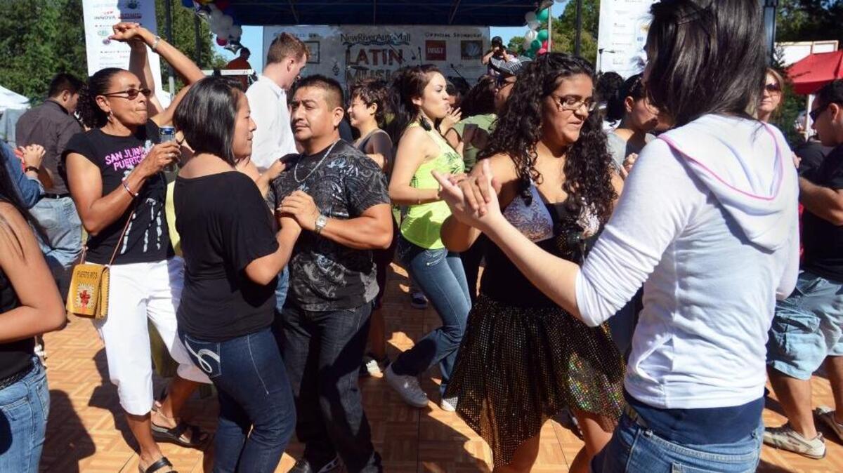 Attendees fill the dance floor during a previous Latin Music Festival at Shelter Cove Community Park on Hilton Head Island. This year’s festival is Sunday.