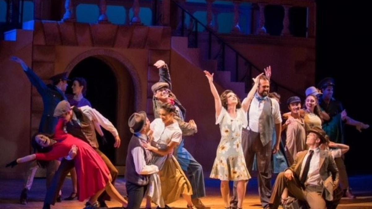 The cast of “Evita” performs.