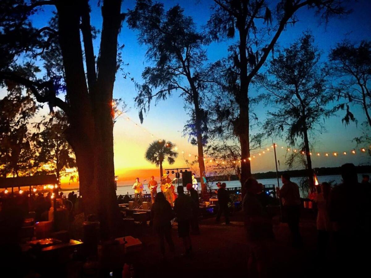 The Hilton Head Island Seafood Festival Pig Pickin + Oyster Roast is one of the best events of the month.
