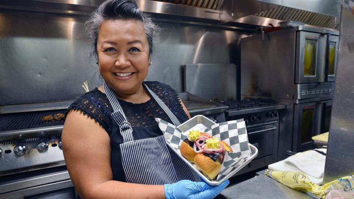 Chef Orchid Palmeier, of One Hot Mama’s American Grille, is heating up the competition in Season 6 of Food Network’s “BBQ Brawl”.