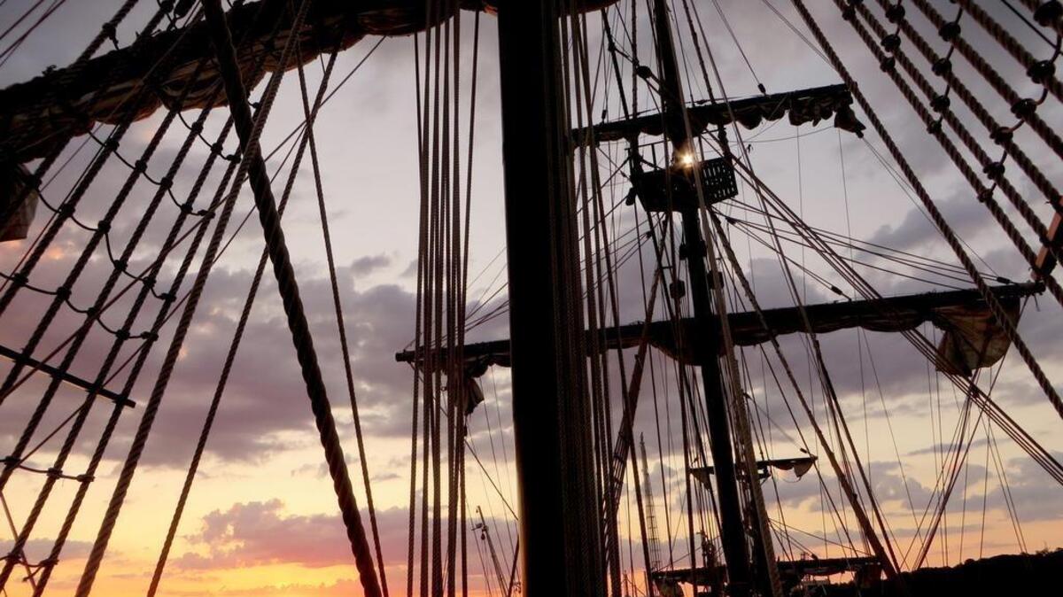 Allan Acree took this photo at sunset from the deck of the El Galeon while docked at the town of Port Royal. The three-masted tall ship is a full-scale replica of a 16th Century Spanish cargo vessel.