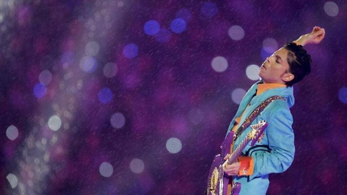 Prince performs during the halftime show at the Super Bowl XLI football game in Miami Feb. 4, 2007.