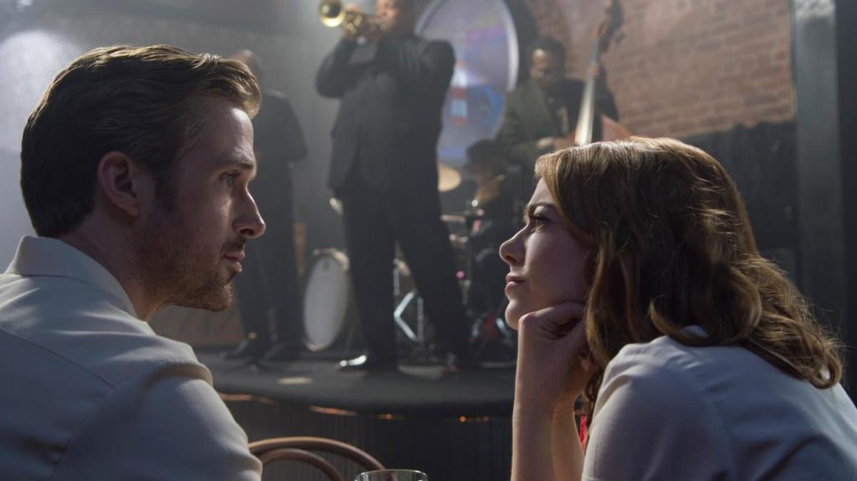 Ryan Gosling and Emma Stone star in a scene from “La La Land.”