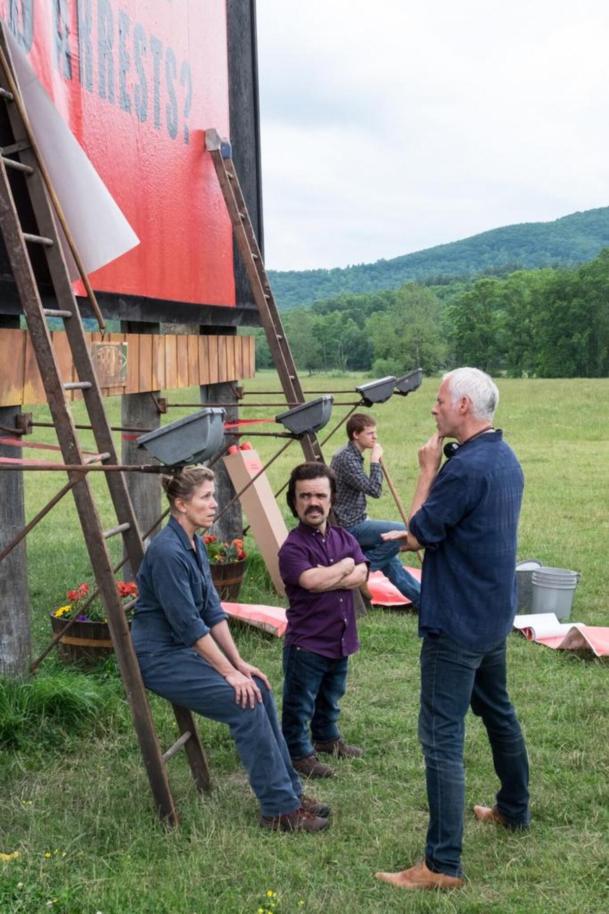 Actress Frances McDormand, actor Peter Dinklage and writer/director Martin McDonagh on the set of “Three Billboards Outside Ebbing, Missouri.”
