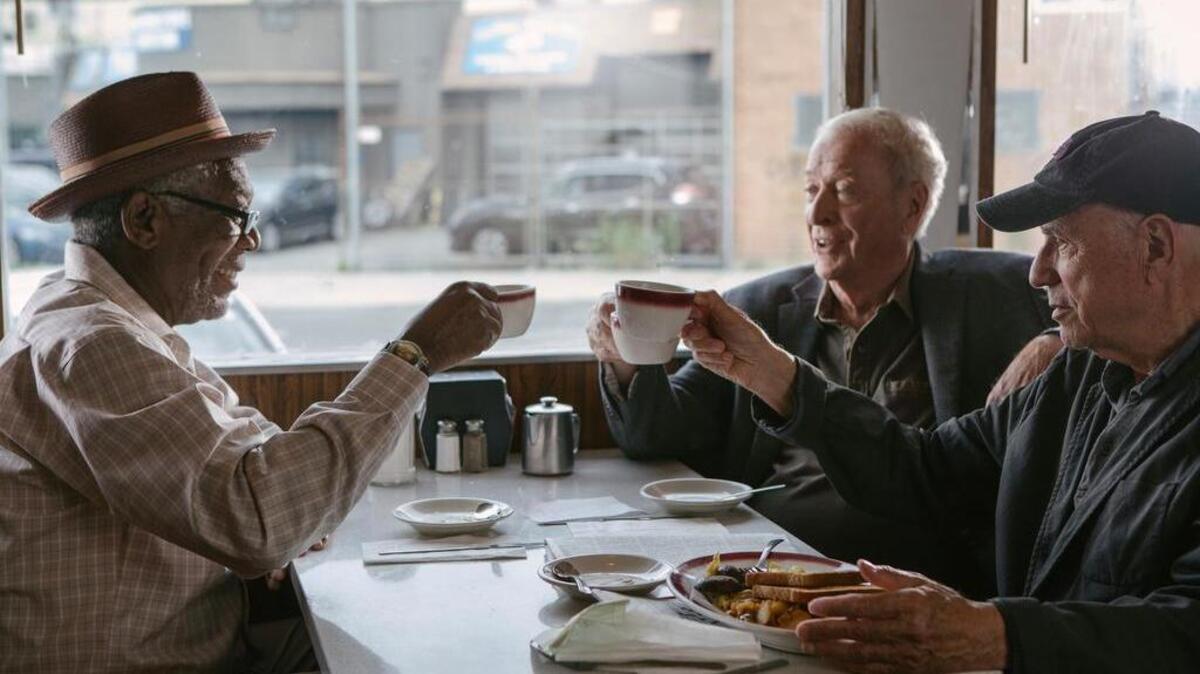 From left, Morgan Freeman, Michael Caine and Alan Arkin appear in a scene from “Going in Style.”