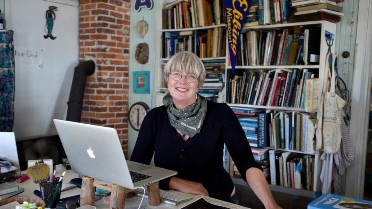 Lillian Heyward, of Bluffton, sits for a portrait in her office at her home on Sunday afternoon. Heyward's work as a graphic design artist was featured in the movie “Three Billboards Outside Ebbing, Missouri.”