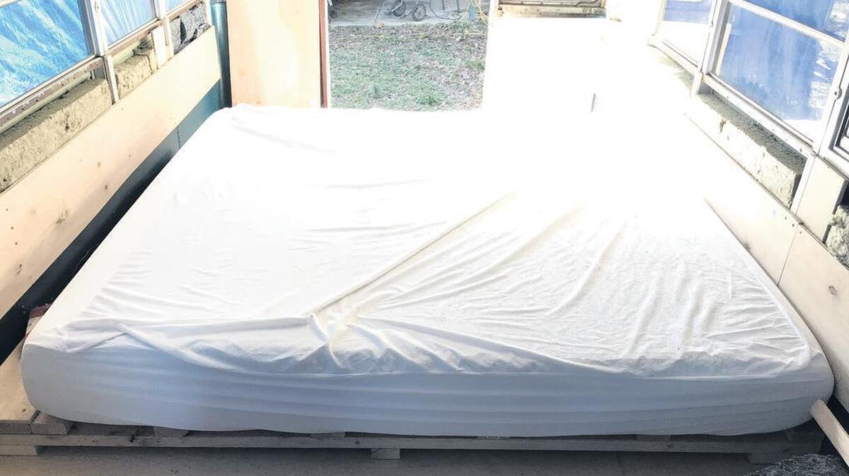 We built a platform bed frame to keep our mattress off the floor.