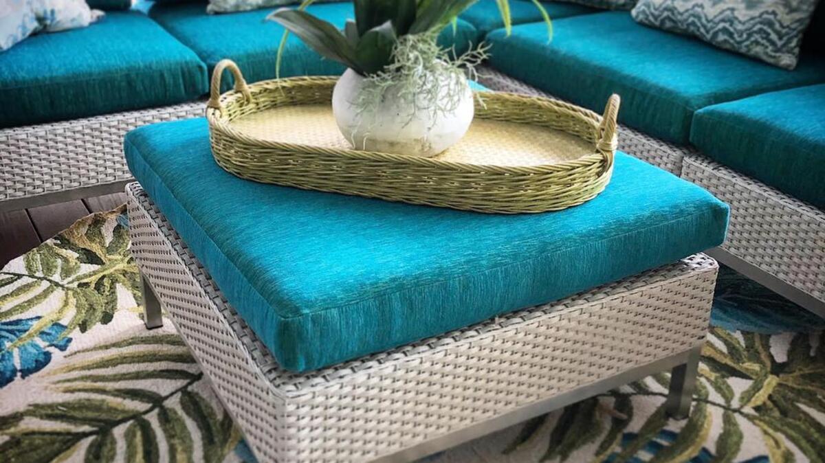 Performance fabrics and textiles have come a long way with advances in plushness and durability. For clients in Sea Pines, we started with a gorgeous tropical leaf patterned rug in saturated colors and then selected this vibrant teal chenille upholstery fabric for the sectional. This poolside lounge is an outside oasis.