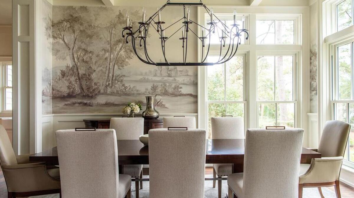 Interior designer Adrienne Warner with 501 South Studio at Court Atkins Group employed this beautiful pastoral scenic wallcovering in her clients’ dining room. The serene mural, rendered in soothing, muted tones, perfectly reflects the home’s setting in Spring Island.