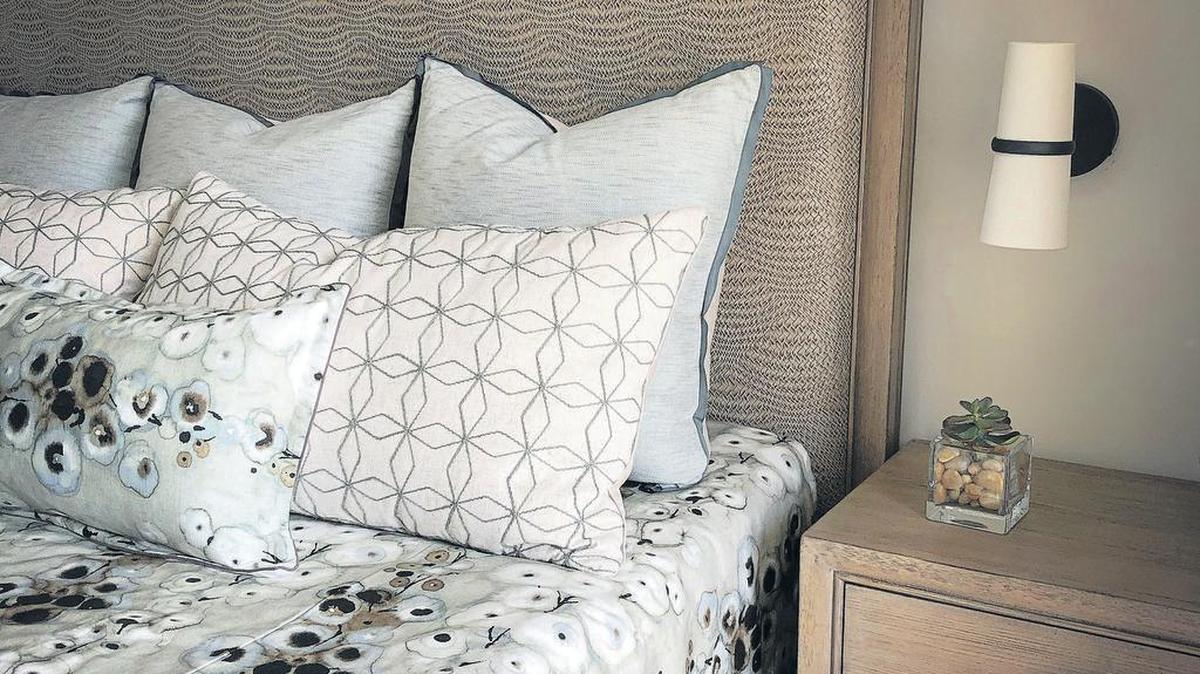 The Modern Organic style abounds in this master bedroom I recently designed for my clients’ beachside getaway. Modern, clean-lined furniture with a hand-worn matte-finish mixes comfortably with layered, woven textiles and an organic floral print on the bedding. The soothing palette brings nature inside for a relaxing vibe.