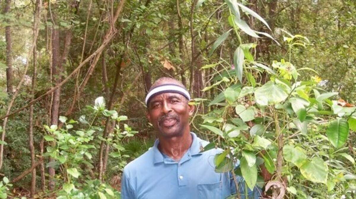 Seen here with Harold Wilson is, perhaps, the tallest butterfly weed in the Lowcountry.