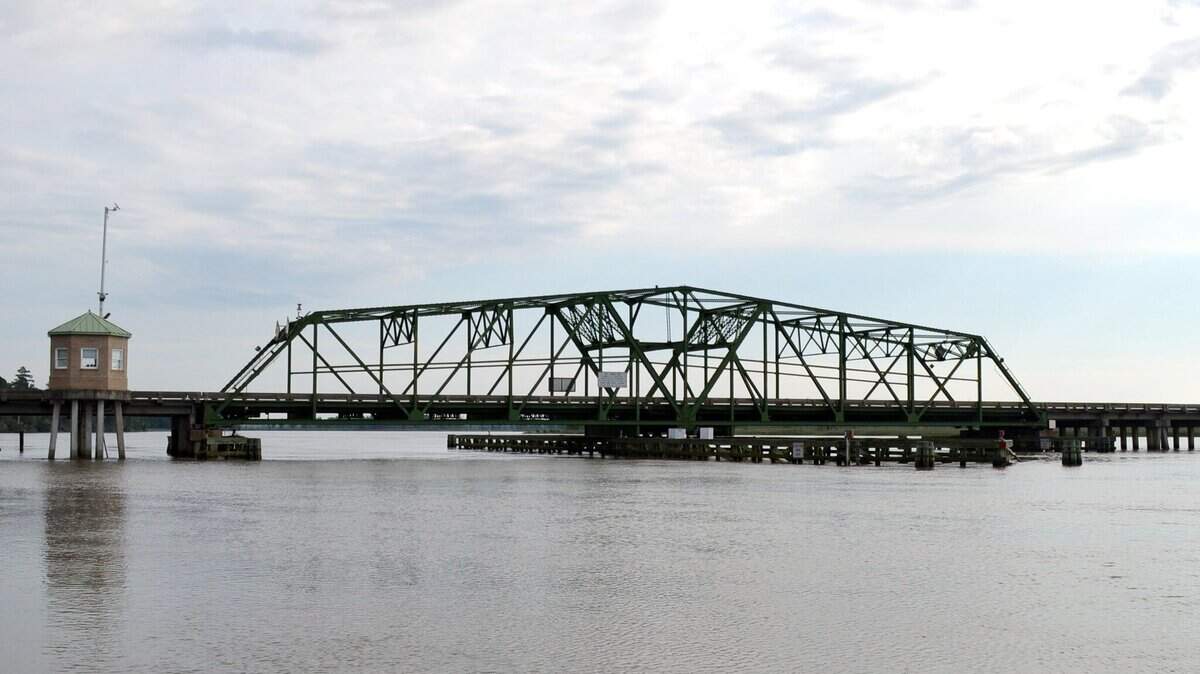 The Houlihan Bridge is a swing-bridge over the Savannah River that was originally constructed in 1922 and later widened in 1954, according to bridgehunter.com.