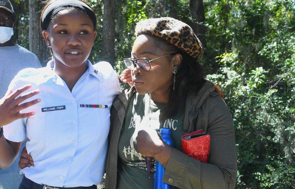 Topaz Williams Fripp, left, recounts the lockdown at Beaufort High School after a report of an active shooter on Wed., Oct. 5, 2022 as her mother Ivory Williams holds her and listens.