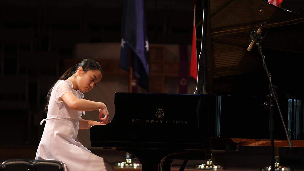 Evelyn Mo, 14, plays the piano during the first round of the Hilton Head International Piano Competition on Monday afternoon at the First Presbyterian Church on Hilton Head Island.