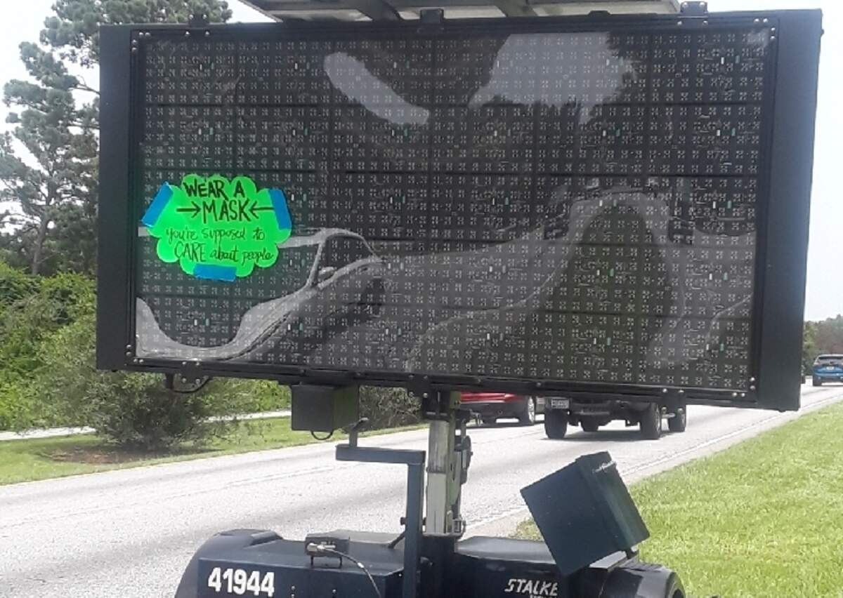 Social media reacted when it noticed a sign requesting residents and visitors wear masks on Hilton Head wasn’t turned on Saturday. A handmade sign was taped over it to inform drivers they should wear face masks.