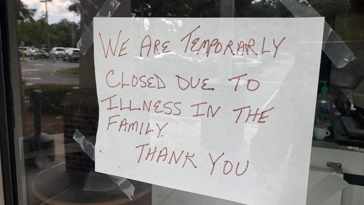 A sign posted on The Greek Table’s door says the Bluffton restaurant is closed temporarily because of illness.