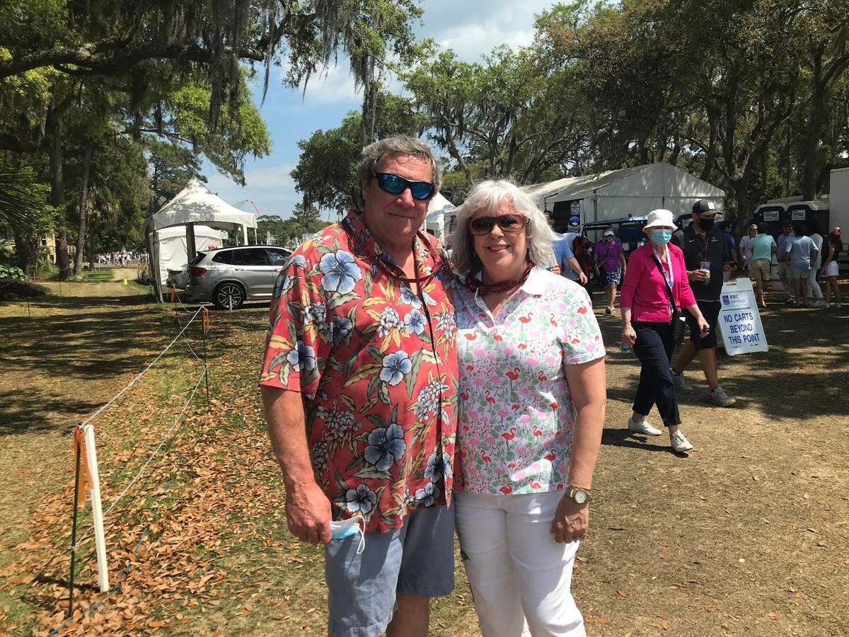 Mike Kilgore, 61, and Debbie Kilgore, 63, both of Hilton Head Island, pose for a photo at the RBC Heritage Presented by Boeing on Sunday, April 18, 2021.