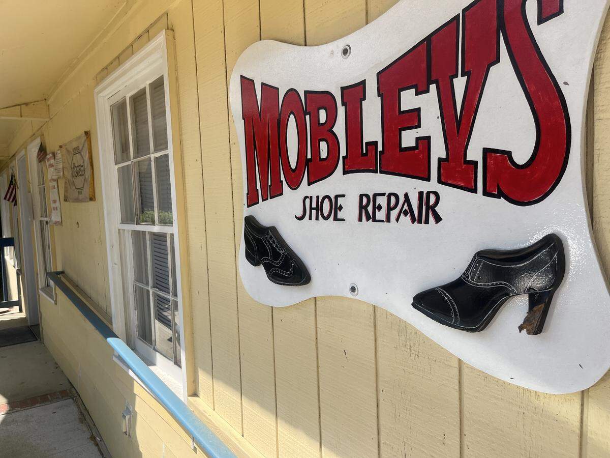 You can’t miss the sign of Stephen and Mary Mobley’s shoe repair shop on Old Jericho Road in Beaufort.