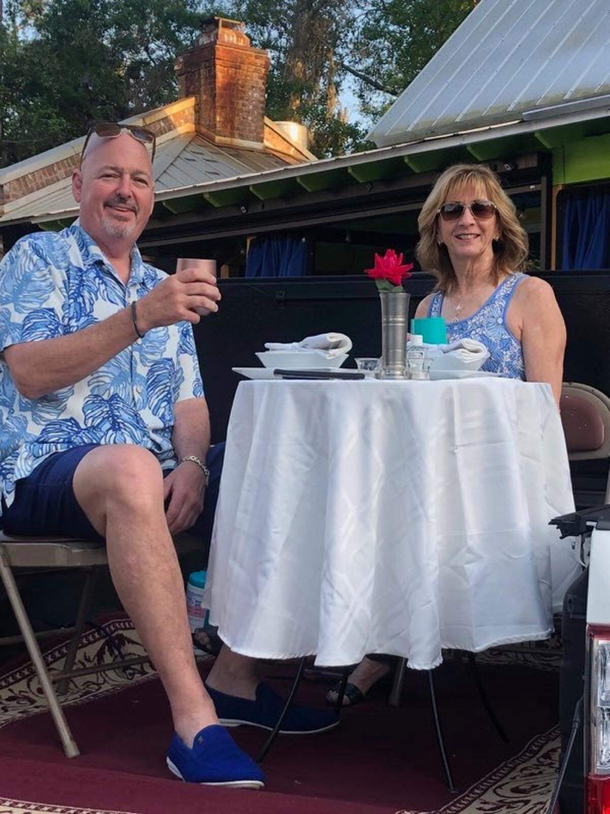 Walt Perkowski and Dionna Bauer share a candlelit social distance date night in Old Town Bluffton.