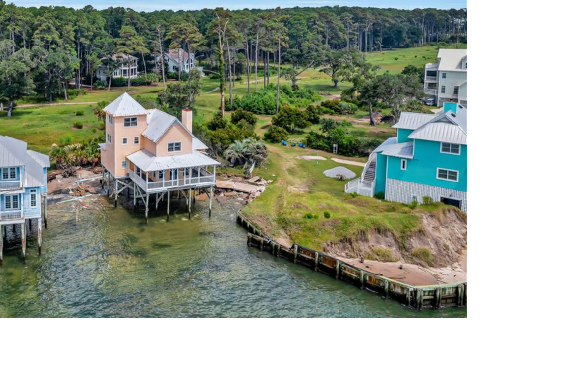 An aerial view shows the cottage at 33 Driftwood Cottage Lane on Daufuskie Island and some of the erosion it faces.