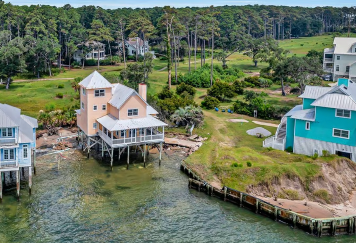 An aerial view shows the cottage at 33 Driftwood Cottage Lane on Daufuskie Island and some of the erosion it faces.