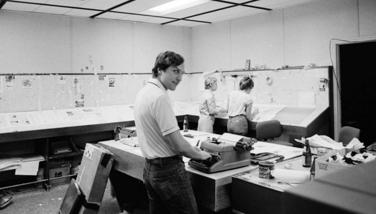 David Lauderdale typing a headline in the composing room of the old Packet building off Pope Avenue on Hilton Head Island in the early 1980s.