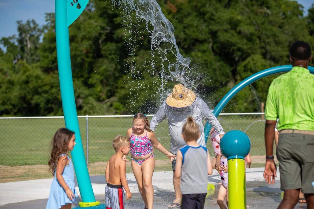 Port Royal Town Councilman Jerry Ashmore gets doused with water at the new splash pad at Bruce Edgerly Park.