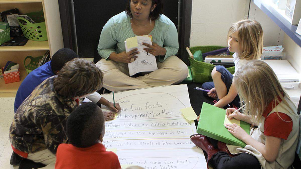 In this file photo, Kim Fields teaches a language-arts lesson to students in the Montessori class at Beaufort Elementary School. Currently, the Montessori program is offered to students in first through third grades, and an upper elementary class will be added next school year.