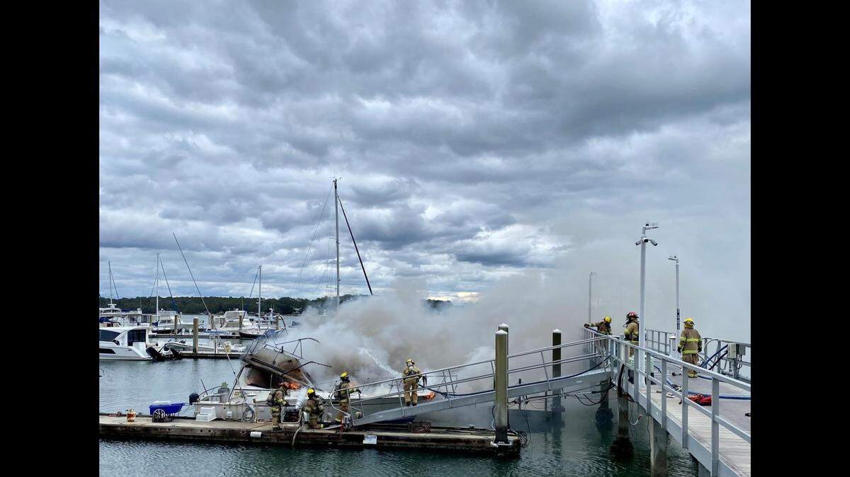 Firefighers from the Beaufort/Port Royal Fire Department respond to a boat fire at the Port Royal Landing Marina on Friday, Jan. 13. No injuries were reported, but the fire spread from the original vessel to another, smaller boat before being extinguished. Photo from the Beaufort/Port Royal Fire Department.