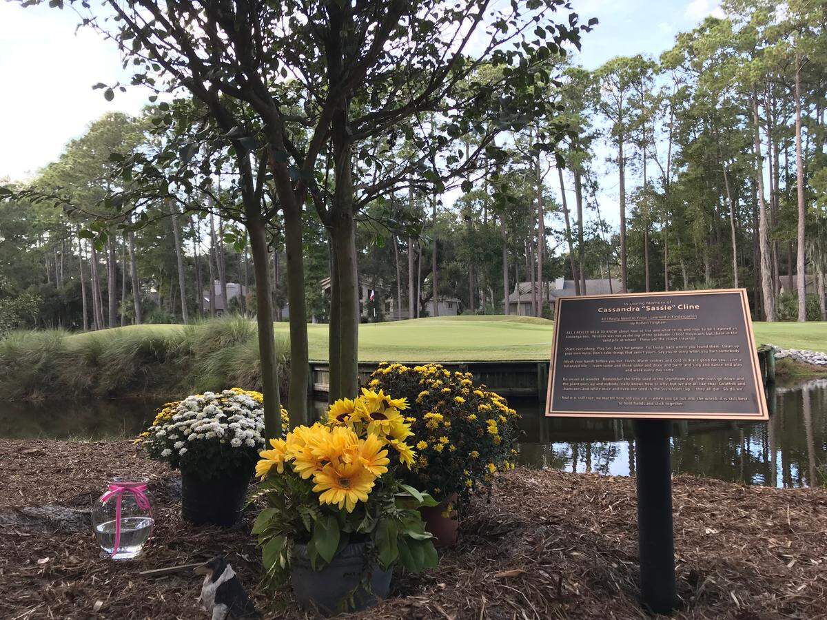 A memorial to Cassandra “Sassie” Cline is marked by a plaque, flowers and newly planted tree, and rests off Governors Lane in Sea Pines on Tuesday, Oct. 22, 2018, on Hilton Head Island, S.C.