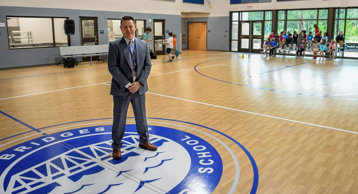 Gary S. McCulloch, CEO and Head of School at Bridges Preparatory School poses for a photo after removing his face covering in the Multipurpose/Cafeteria on Thursday, Oct. 29, 2020 in Beaufort. McCulloch expects the student population at the fast-growing charter school currently at 1,072 to reach 1,470 by 2023.