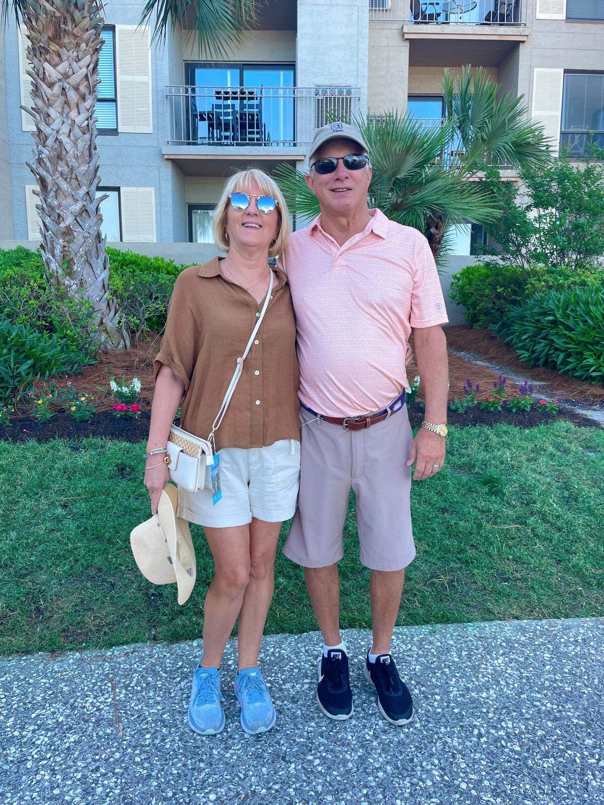 Warren and Christie Beam pose for a photo after browsing in one of the tournament’s golf shops in Harbour Town.