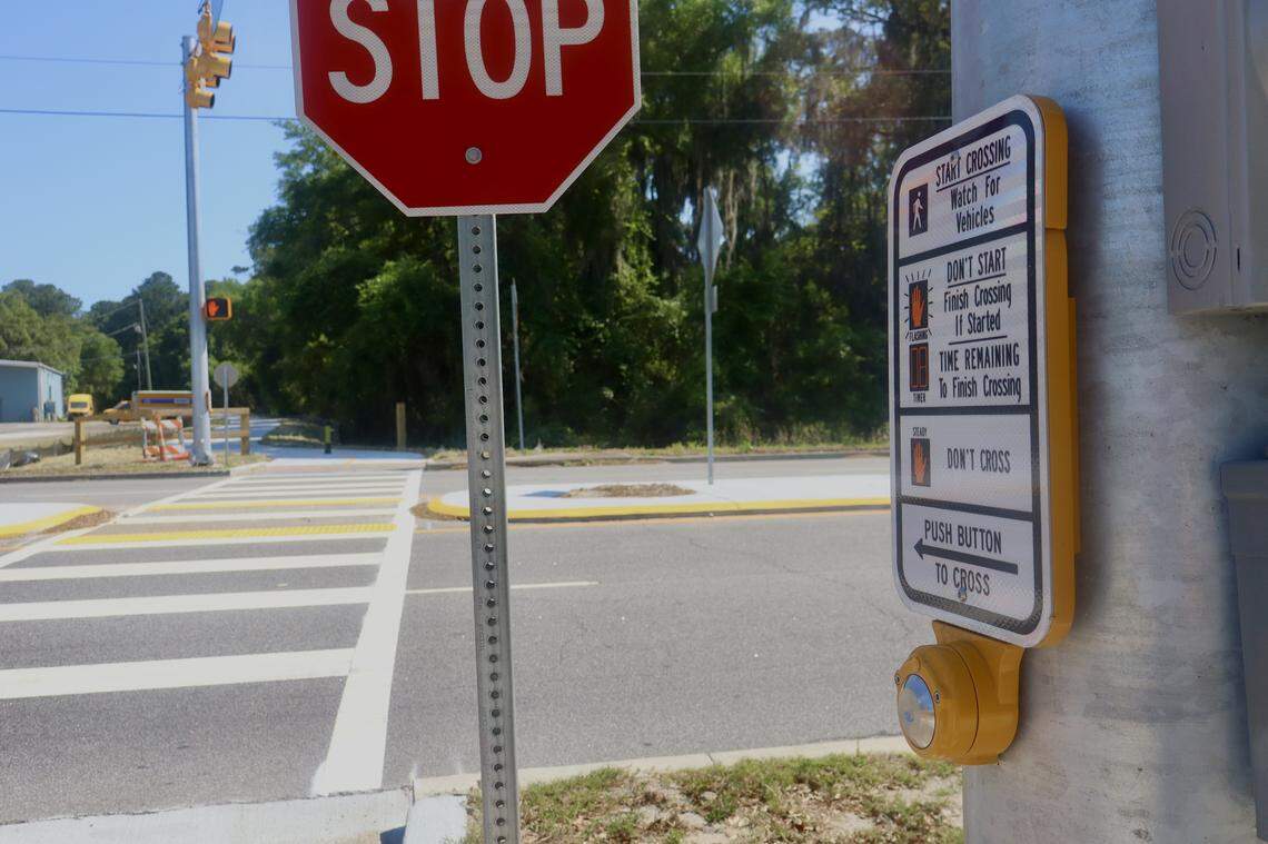 Pedestrians and bicyclists at the Spanish Moss Trail’s intersection with Ribaut Road can use this button to briefly stop traffic and cross the busy street.