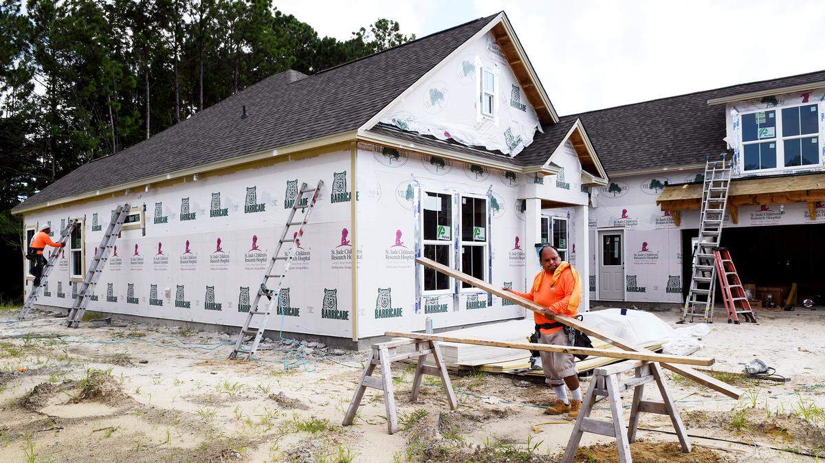 Another home goes up on Danbridge Court in Bluffton’s Lawton Station development on Monday.