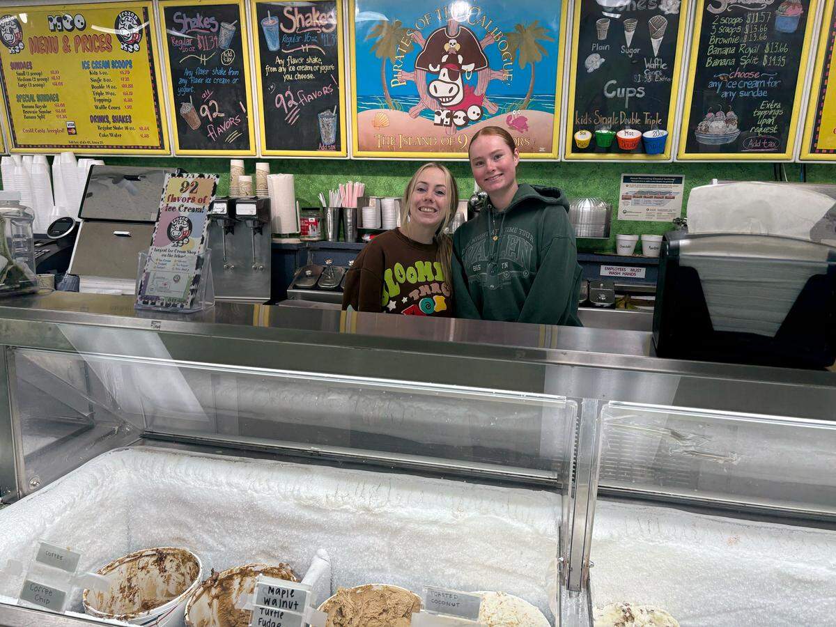 Savannah Rose Toomer and Emma McCarthy work at Frozen Moo ice cream on Saturday, Jan. 31, right before snow started coming down on Hilton Head.
