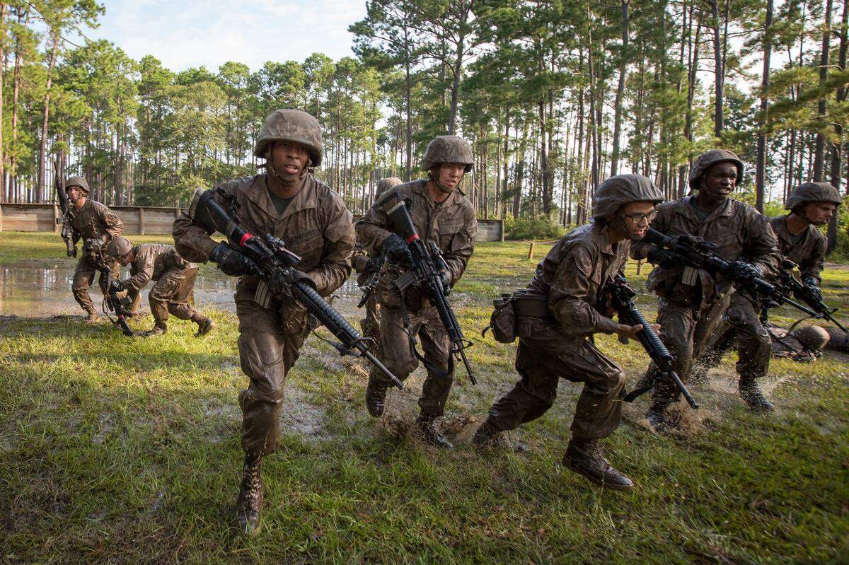 United States Marine Corps recruits of Charlie Company, 1st Recruit Training Battalion, run through an obstacle course Sept. 15, 2017, on Parris Island, S.C. The Crucible is the final test a recruit must pass before earning the Eagle Globe and Anchor emblem. Charlie Company is scheduled to graduate Sept. 22, 2017. Parris Island has been the site of Marine Corps recruit training since Nov. 1, 1915. Today, approximately 19,000 recruits come to Parris Island annually for the chance to become United States Marines by enduring 12 weeks of rigorous, transformative training. Parris Island is home to entry-level enlisted training for 49 percent of male recruits and 100 percent of female recruits in the Marine Corps. (U.S. Marine Corps photo by Lance Cpl. Joseph Jacob)