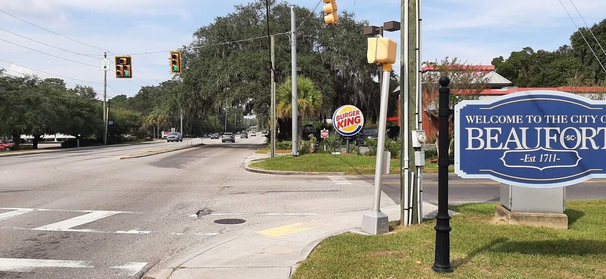 Hubcaps and tree roots plugged up a storm drain pipe near this intersection on Ribaut Road.