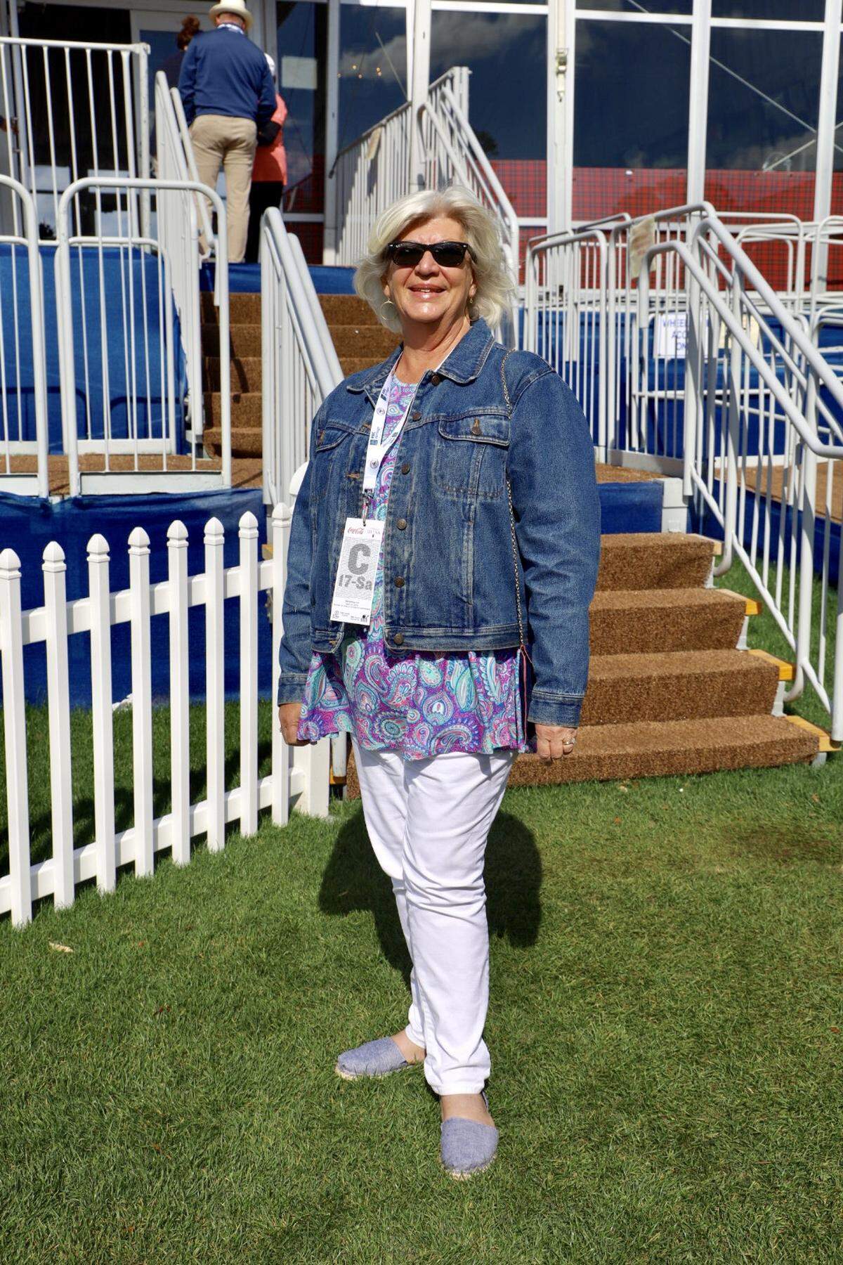 This will be Mary Miller’s sixth year attending RBC Heritage Presented by Boeing golf tournament. Mary, who lives in Bluffton, wears her bright pastel colors with white pants and a denim jacket. She also wears espadrilles flats that complete her fashionable spring outfit.