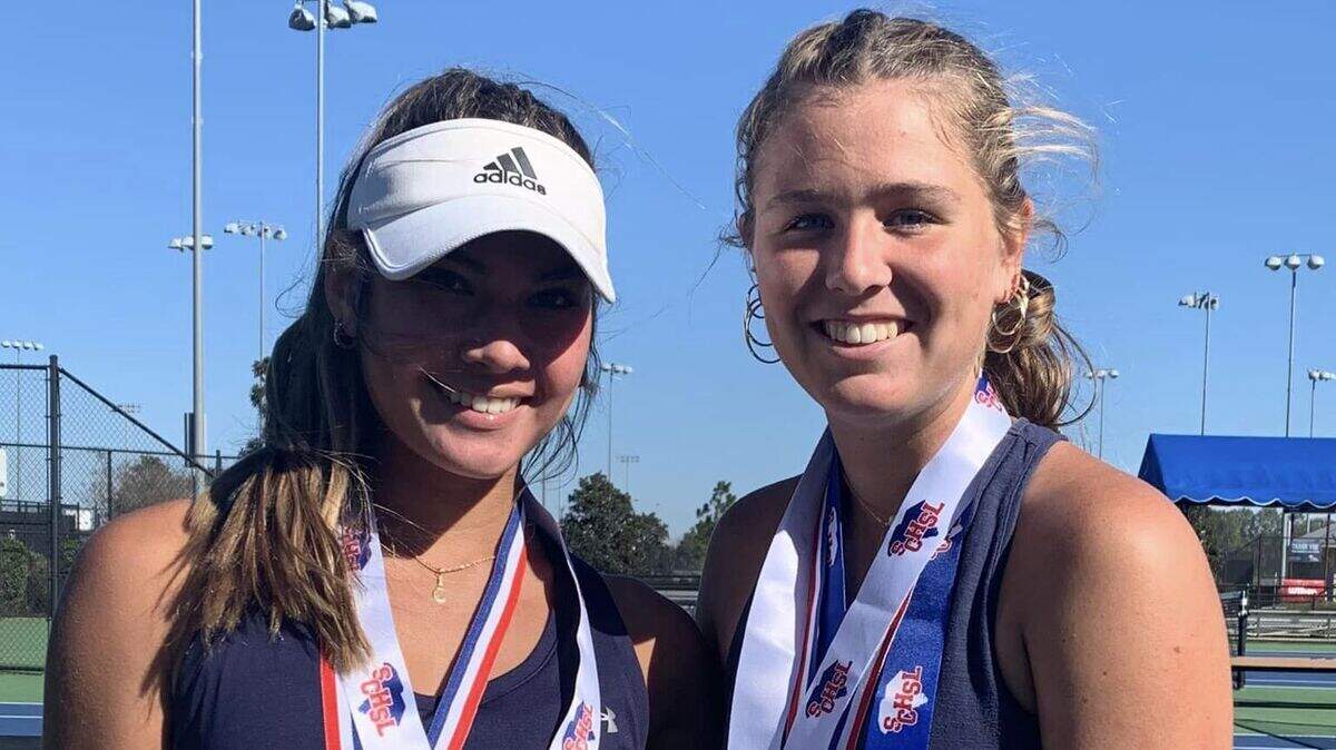 Hilton Head Island’s Emily Ruckno, right and teammate Hailey Poplin pose for a photo after the Class 4A/5A individual championship. Ruckno won the individual championship and Poplin was all-state.