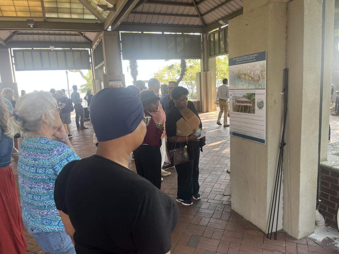 Inda Walker checks out one of the promenade reconstruction alternatives on Wednesday during a meeting at Waterfront Park. “I just want to fix what’s wrong,” she said.