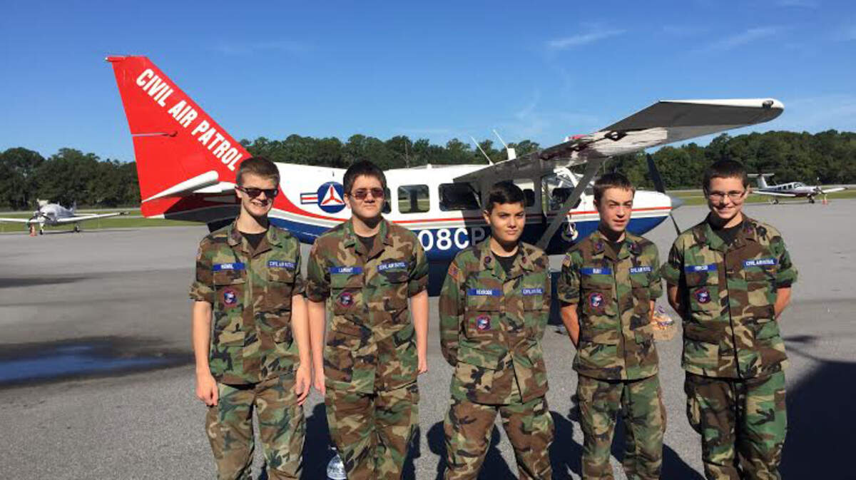 Civil Air Patrol cadets await their flight on the Maryland CAP Wing GA-8 Airvan, Oct. 8, 2015.