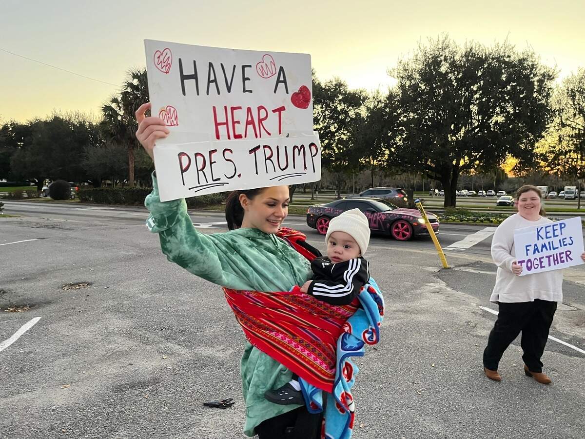 Amelia Steinhauer, holding son Elijah Heyward, and Samantha Stricker, right protest the Trump administration’s immigration policy Monday in Beaufort. A small group gathered at Ribaut Road and Boundary Street in Beaufort to show their concern about a number of the new administration’s policies.