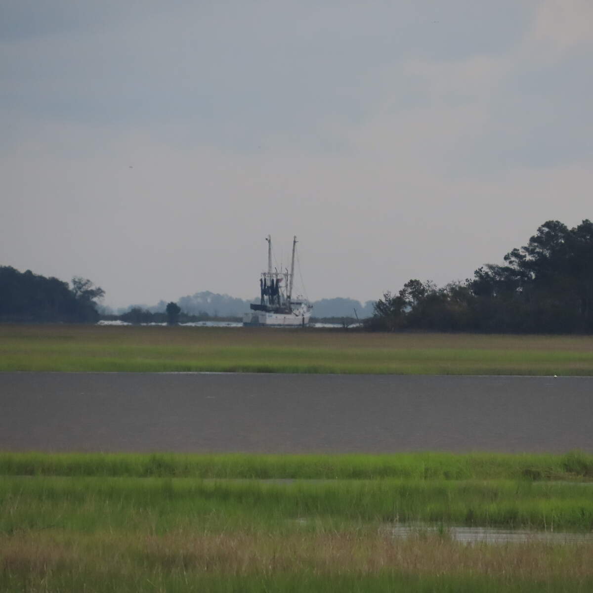 A shrimp boat on the Morgan River rights itself with the high tide Tuesday evening before heading out to St. Helena Sound.